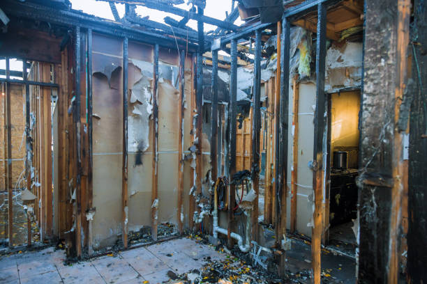 Professional Fire Damage Restoration technician working in Cheboygan, MI